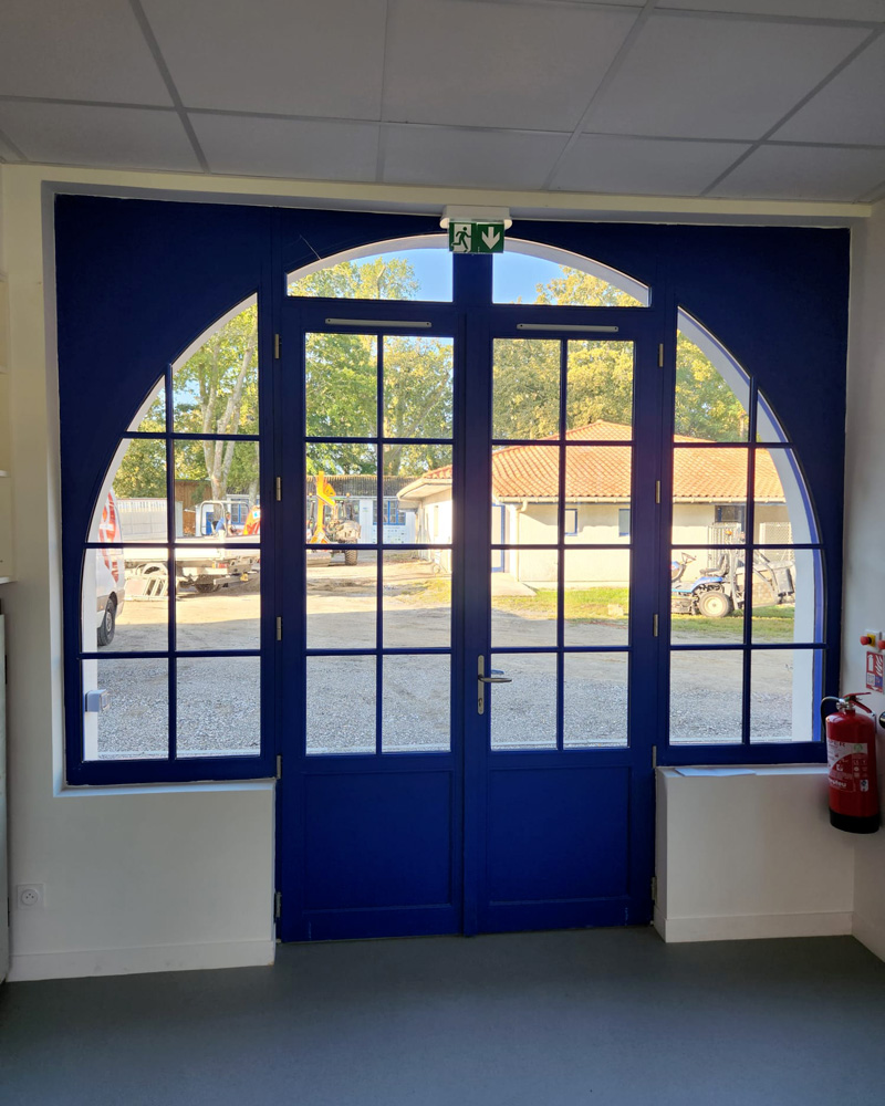 Menuiseries cintrées bois au stade de Soustons